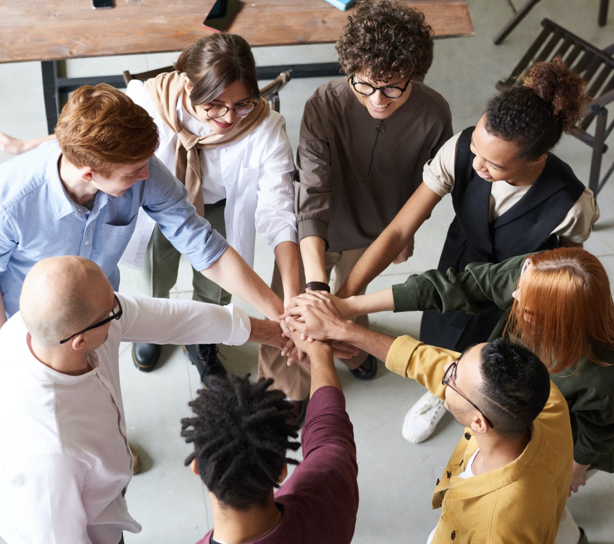 photo-of-people-holding-each-other-s-hands-3184423_small